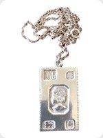 1977
Silver
Silver Bullion Bar Pendant On Silver Chain
